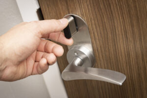 Hand locking or unlocking deadbolt door lock